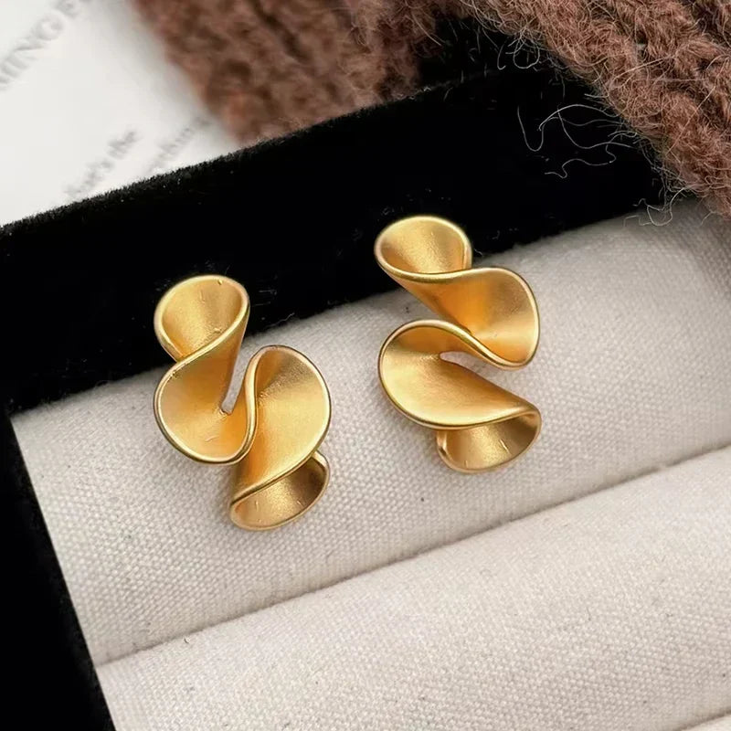 Elegant Earrings for Women with Flowy Gold Design