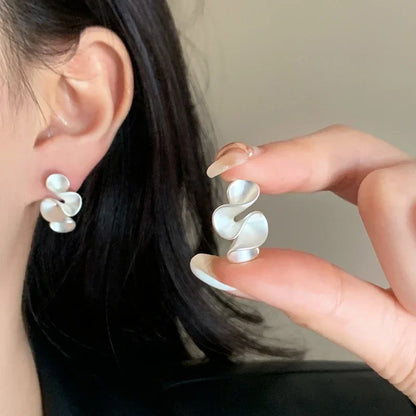 Elegant Earrings for Women with Flowy Gold Design