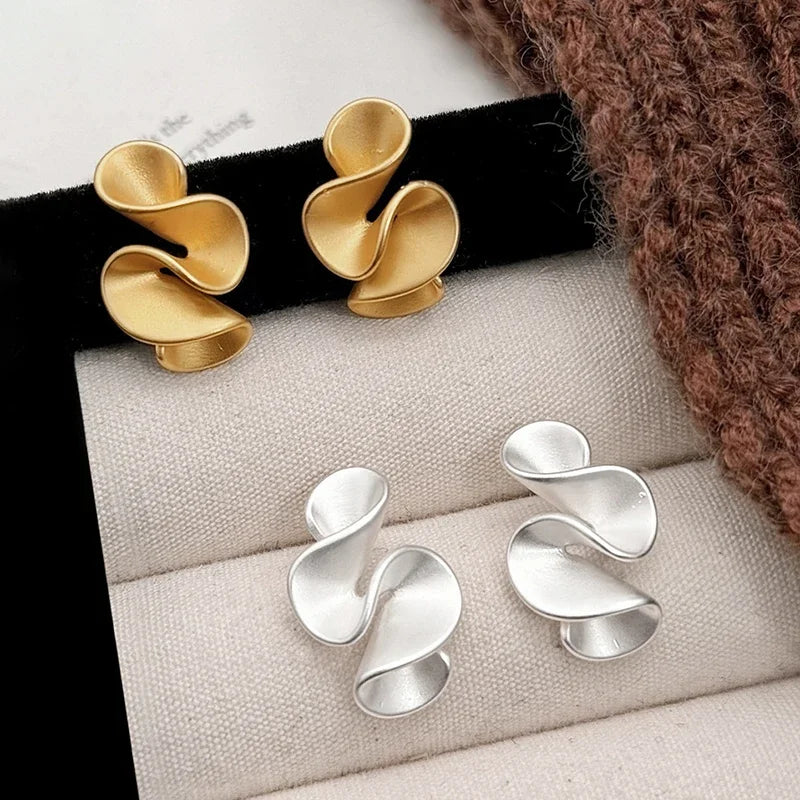 Elegant Earrings for Women with Flowy Gold Design