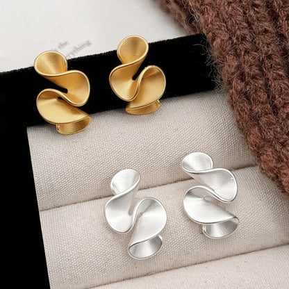 Elegant Earrings for Women with Flowy Gold Design
